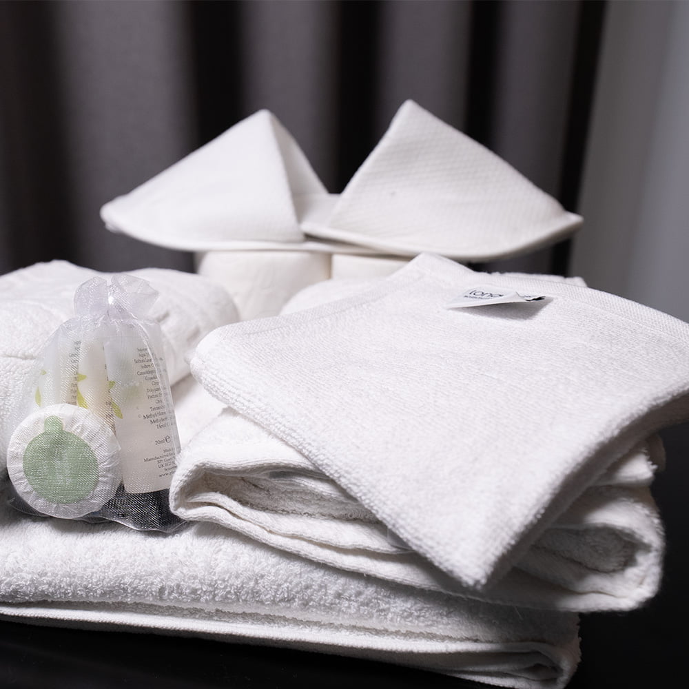 This white bathrobe is made from high-quality AVS cotton yarn and offers softness, breathability, durability, and absorbency. Crafted in Turkiye, it combines elegance with comfort, making it a perfect addition to your loungewear collection.