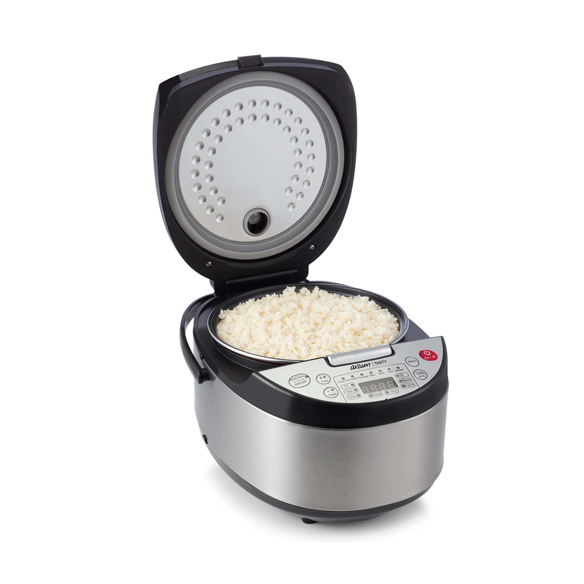 The Arzum Tasty Rice Cooker is an ideal solution for hotels, healthcare centres, student accommodations, and more. This versatile appliance, powered by a 1023W motor and featuring a 4-litre capacity, simplifies meal preparation for the whole family. The non-stick-coated inner pot ensures even cooking and easy cleaning, while the sleek stainless-steel housing with black accents adds modern elegance to your kitchen. The detachable steam outlet and inner pot make maintenance simple.
