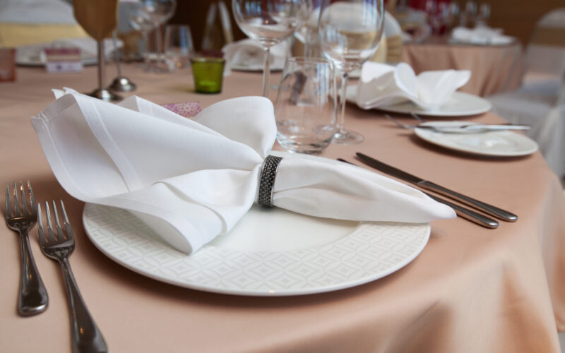 Set-up,Dinner,Room,In,The,Hotel.,Folded,Napkin,Laid,On Set-up,Dinner,Room,In,The,Hotel.,Folded,Napkin,Laid,On