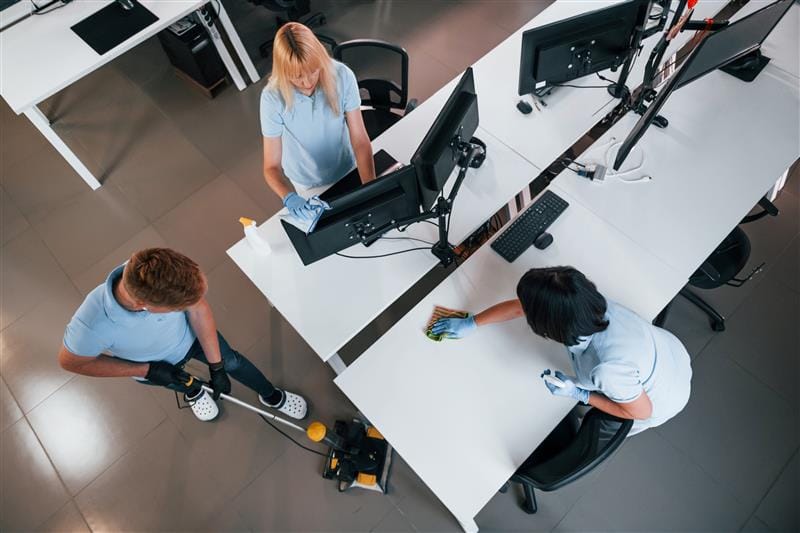 Workers cleaning am office